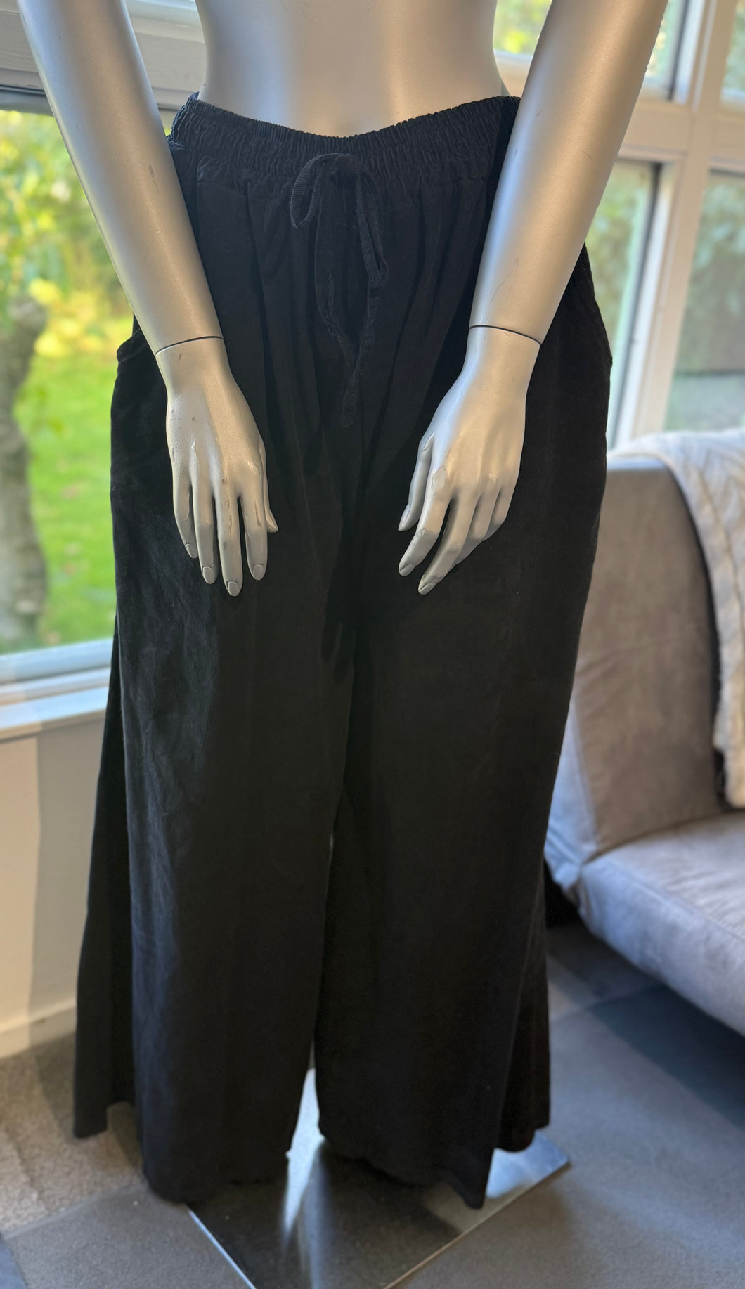 Black cord wide leg trousers